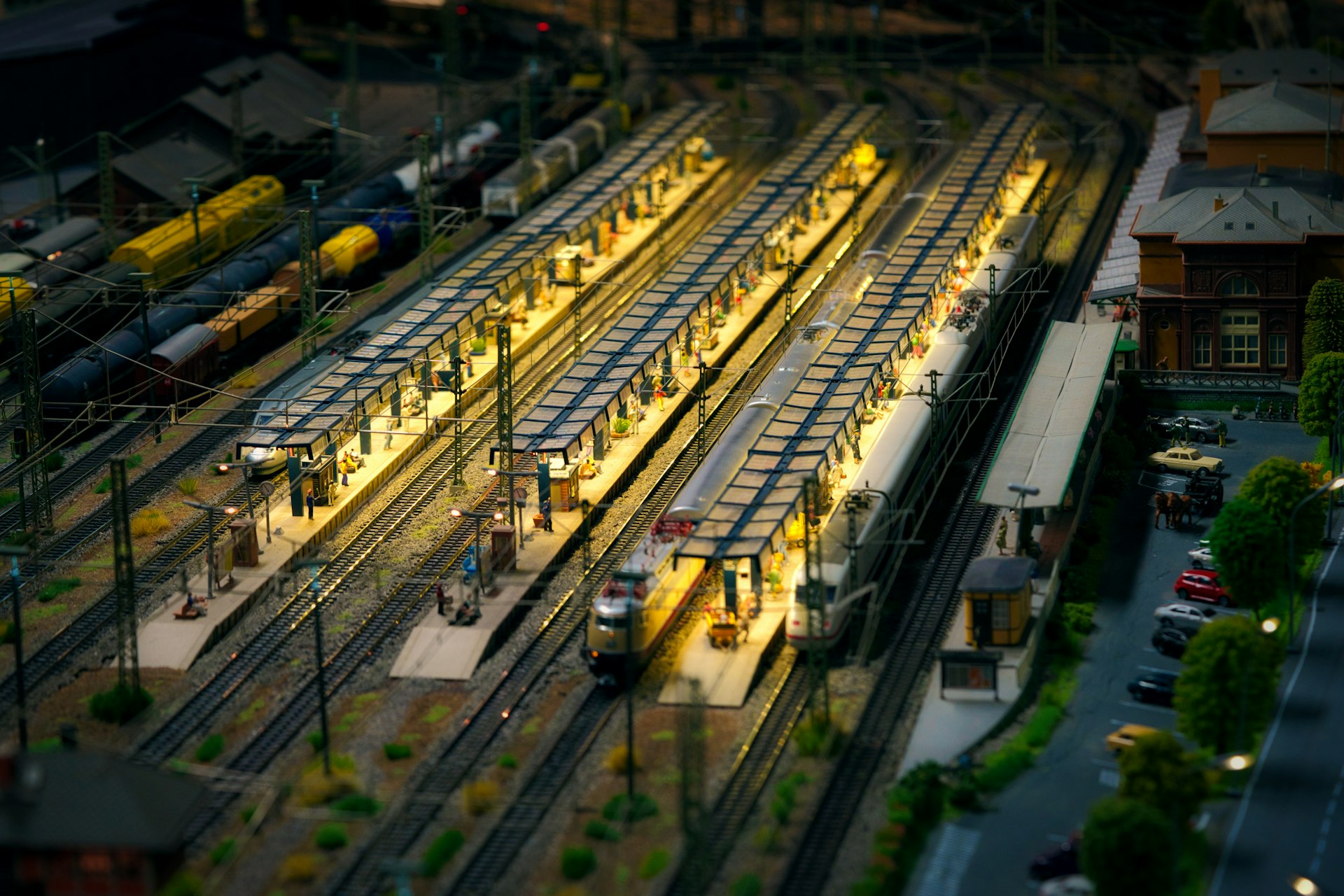 An aerial view of a train yard at night